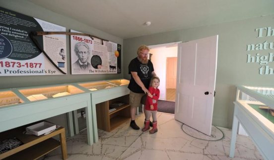 Adult and child inside the museum